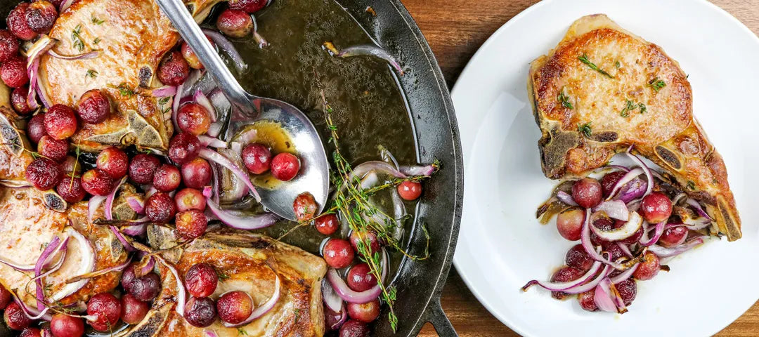 Bone-in Pork Chops With Roasted Grapes And Red Onions